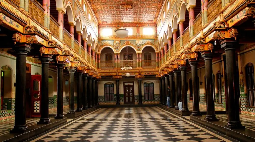 Pillared hall with a chequered floor in a Chettinad mansion