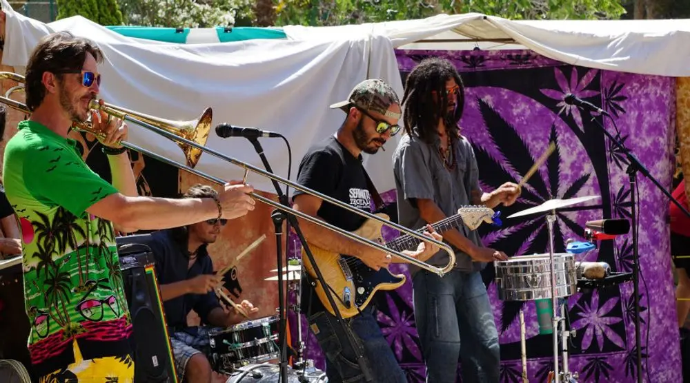 Band performing at an outdoor festival