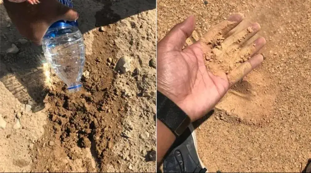 Pouring water on dry soil and a sandy hand