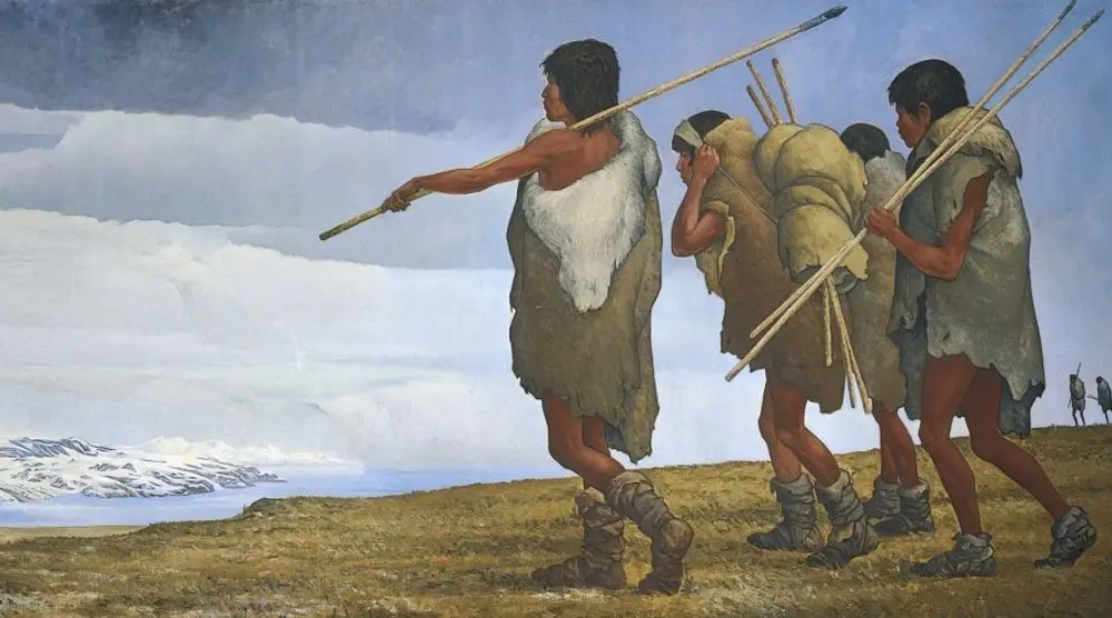 Painting of prehistoric hunters on the move