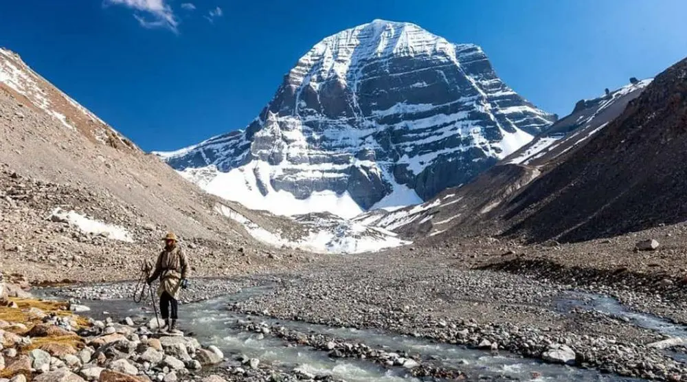 Snow-capped Mount Kailash above a valley