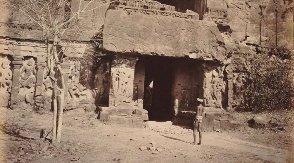 Old photograph of a rock-cut shrine at Ellora