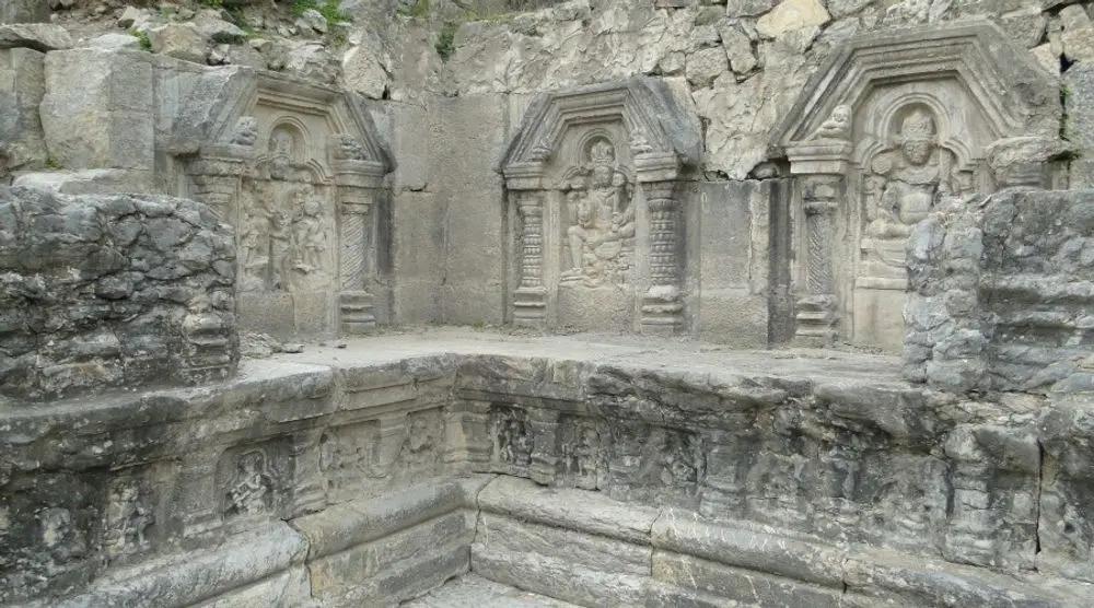 Carved niches on the ruined walls of Martand