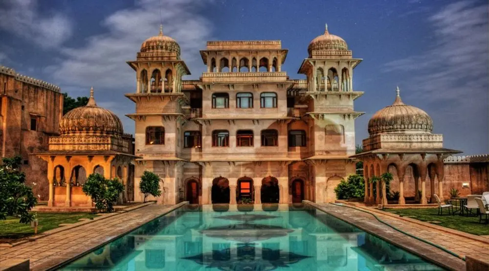 Domed palace pavilions beside a pool