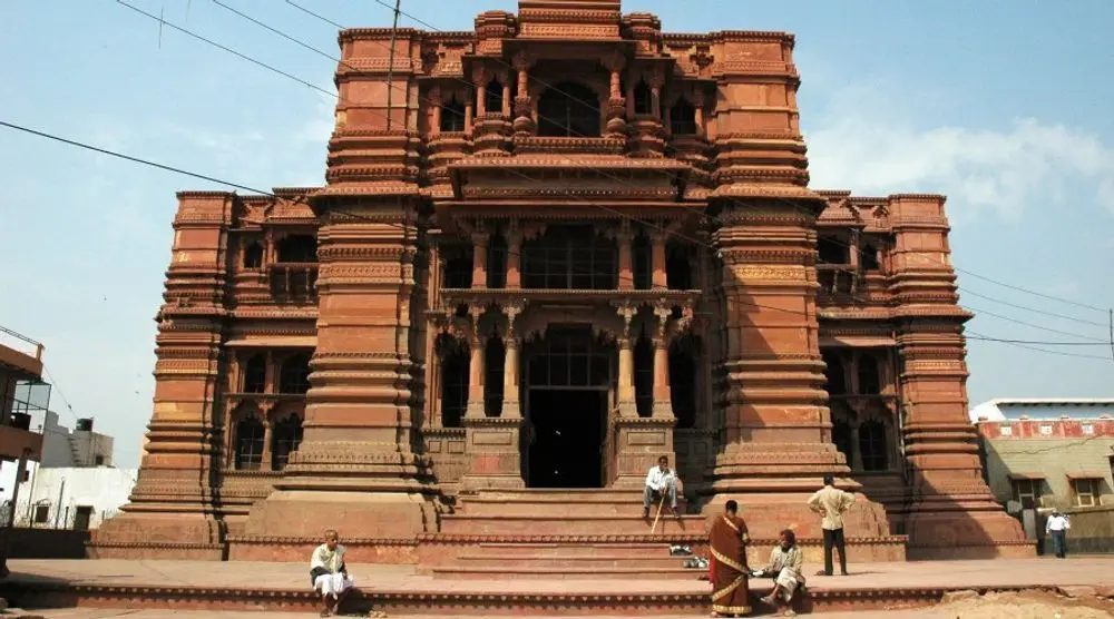 Red sandstone temple with carved towers