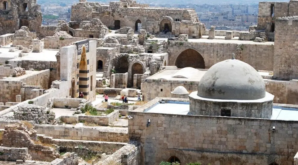Domed rooftops and ruins in Aleppo