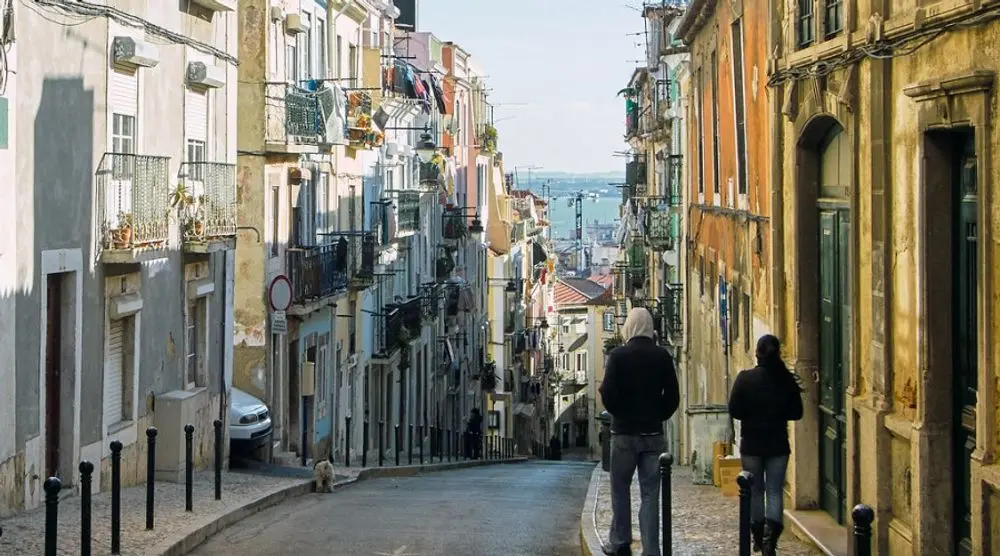 Steep street of tiled houses in Lisbon