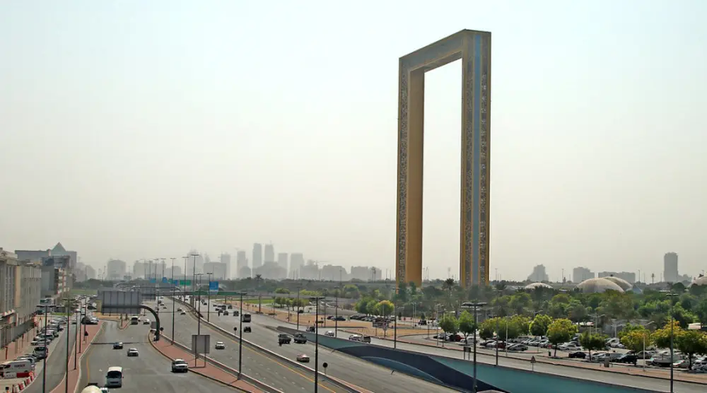 The Dubai Frame beside a highway
