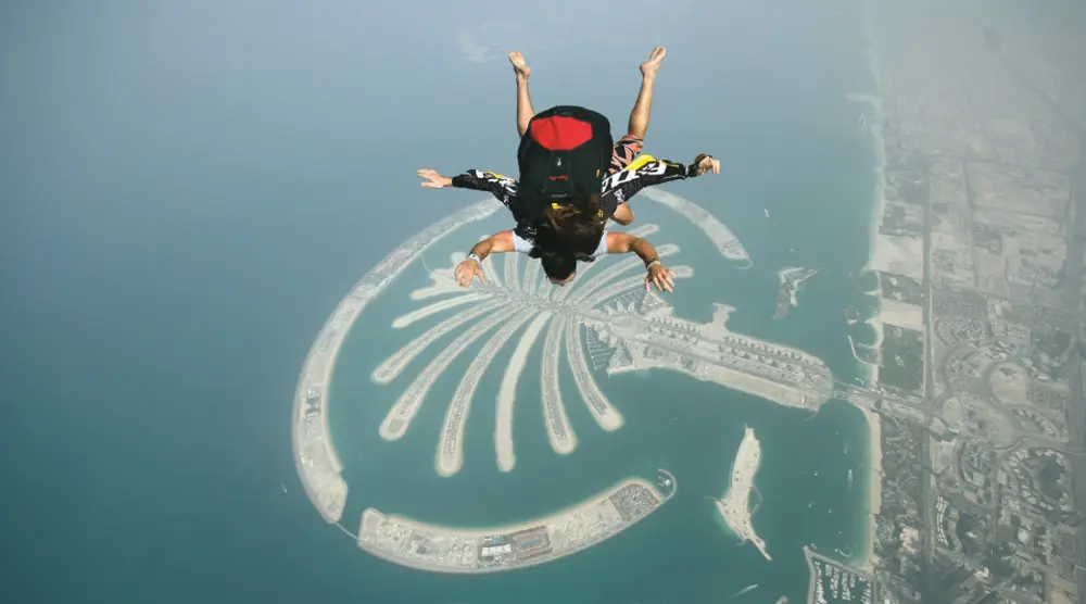 Skydiver in free fall above Palm Jumeirah