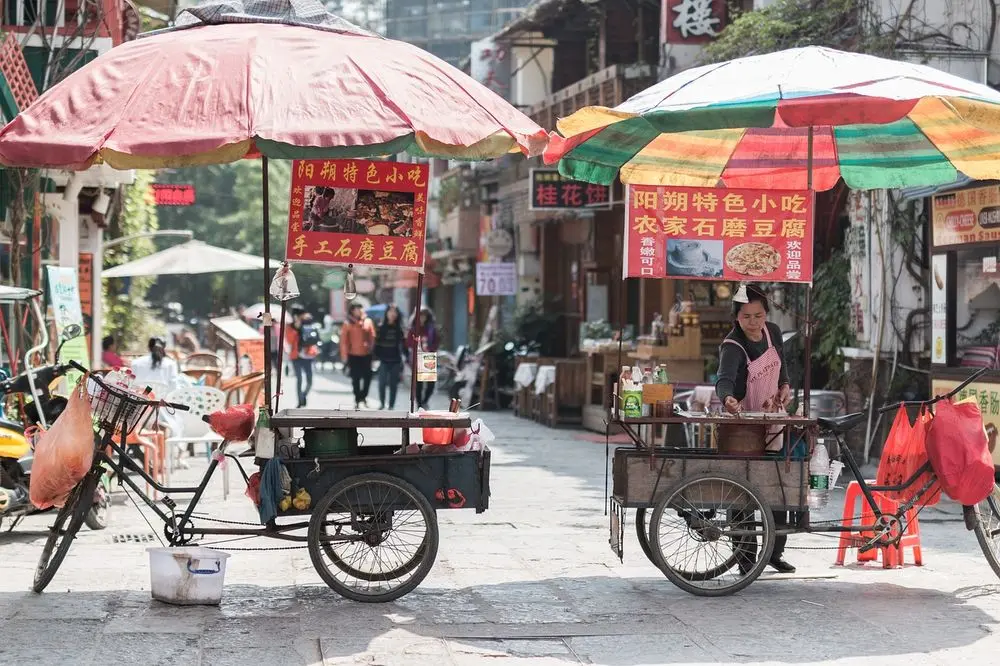 Street food carts under umbrellas in China
