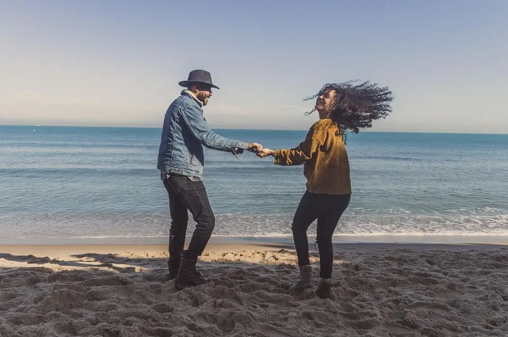 Couple dancing on a beach