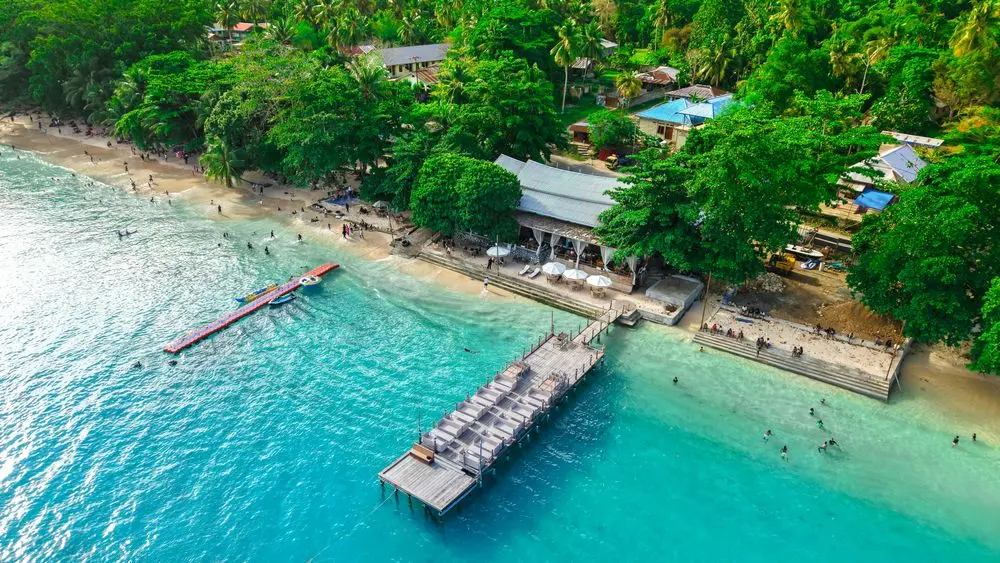 Aerial view of a jetty over turquoise water