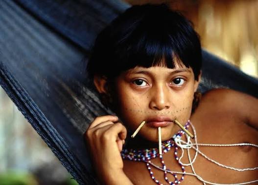 Yanomami girl with facial piercings