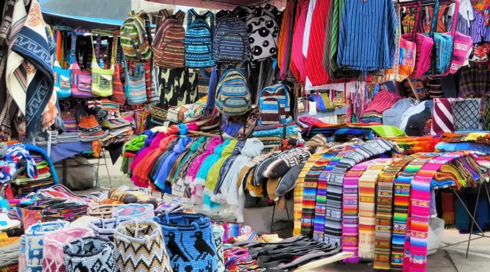 Colourful bags and textiles at a Delhi market stall