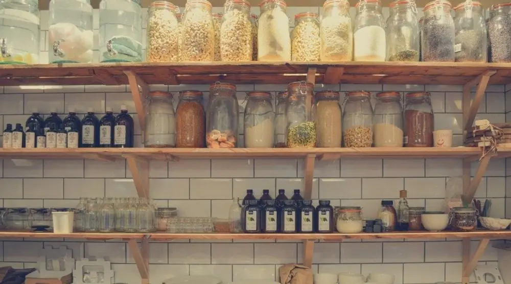 Pantry shelves of glass storage jars
