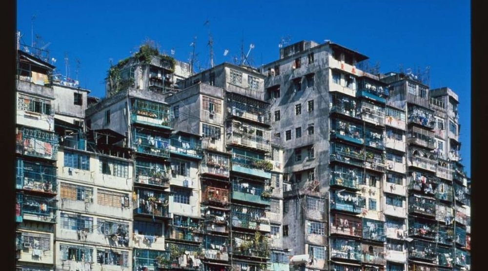 Densely packed high-rise blocks of Kowloon Walled City