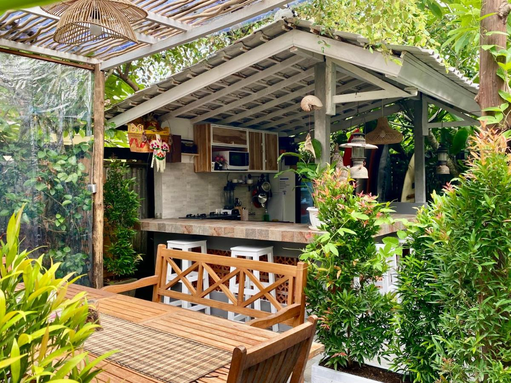 Open-air kitchen and dining area at a homestay