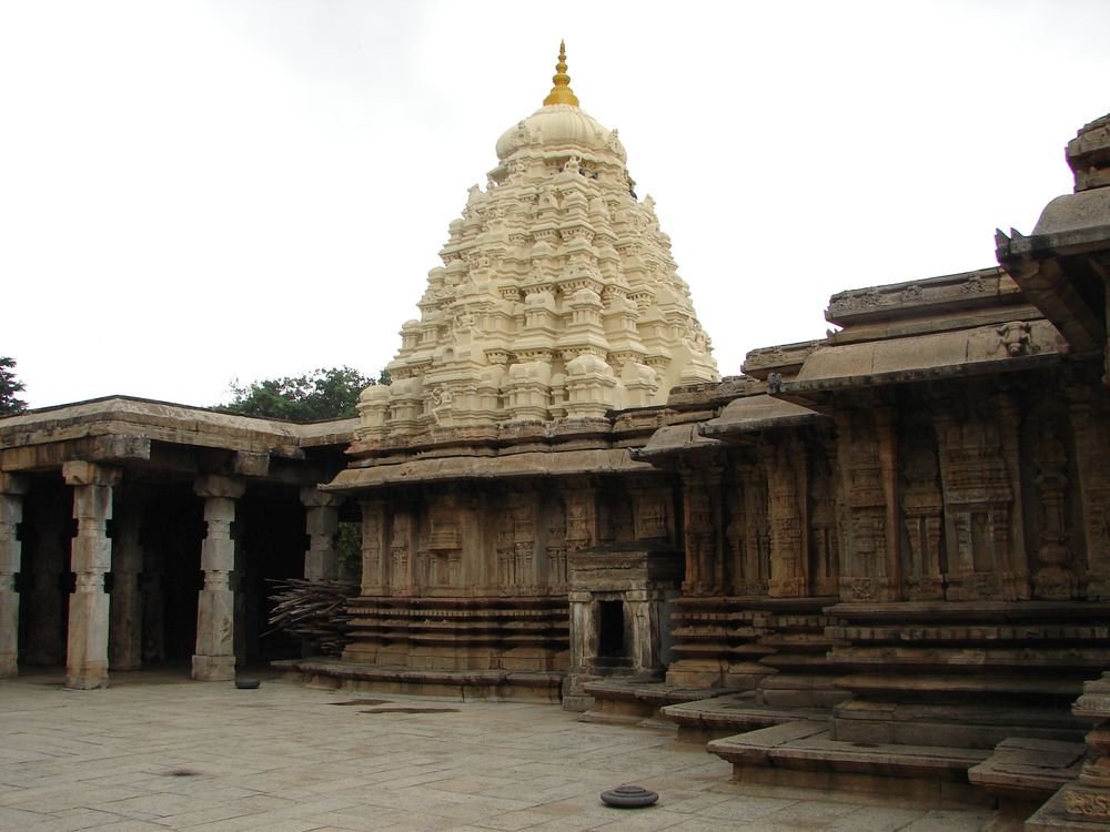 Stone temple with a white gopuram at Talakadu